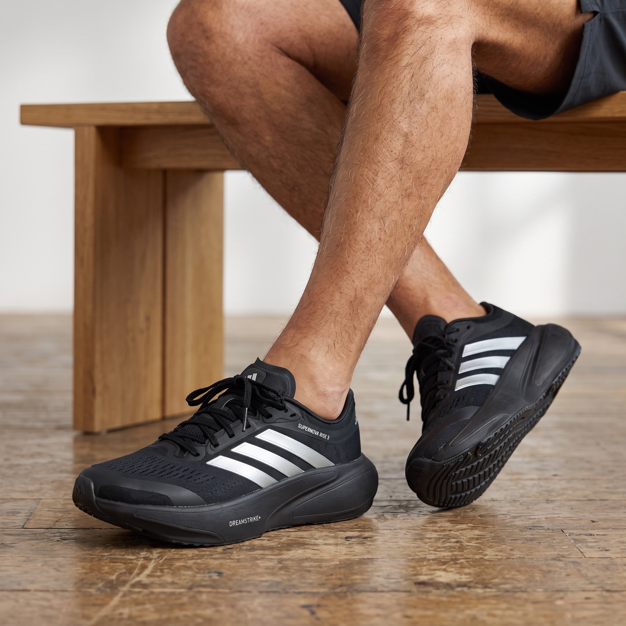adidas supernova rise 3 black sneakers with silver stripes