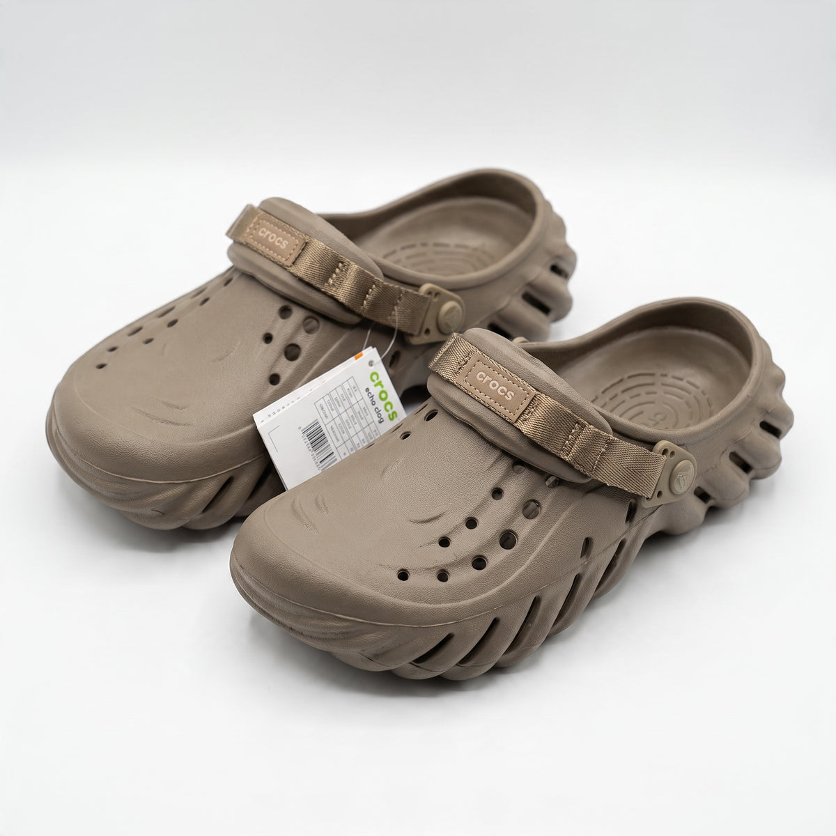 Pair of taupe Crocs Echo Clog with adjustable strap and vented upper