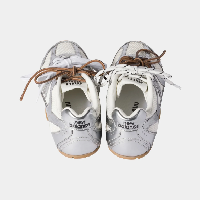 New Balance 328 silver and white trainer with gum sole and mesh upper