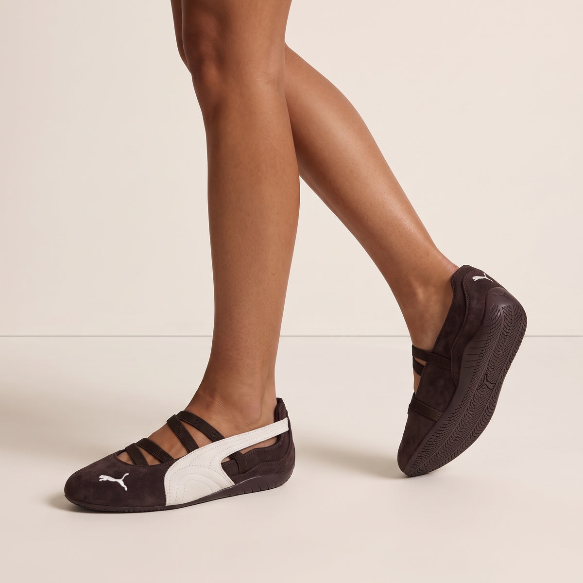 Brown Puma Mary-Jane ballet-style trainer with white formstrip and elastic straps