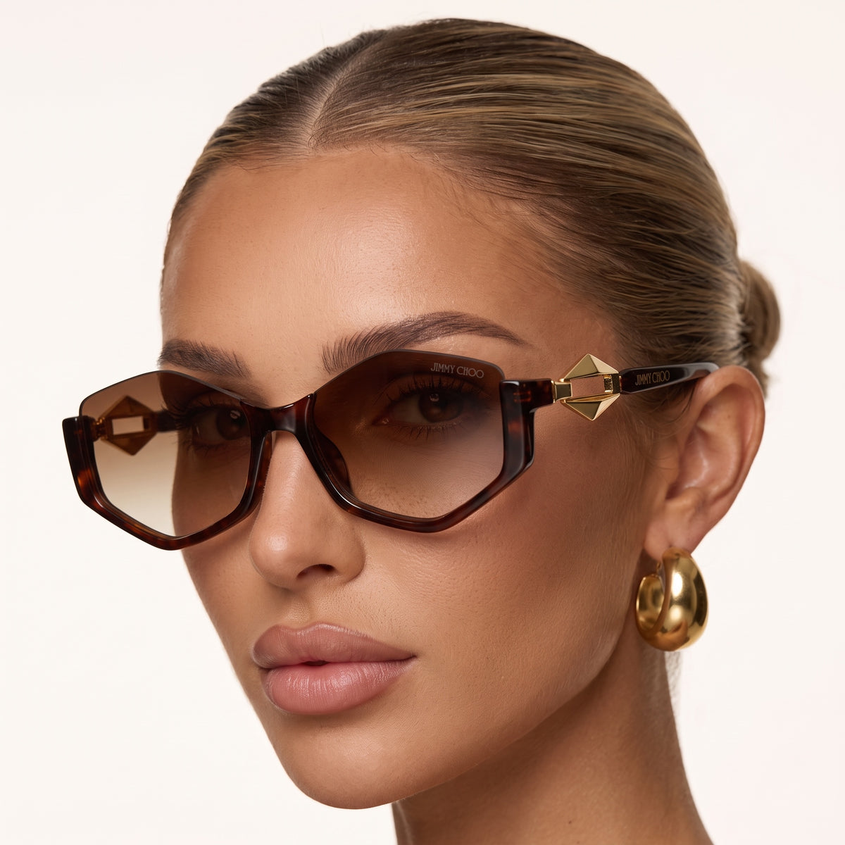 Jimmy Choo tortoise square sunglasses with brown gradient lenses and gold pyramid detail on temple