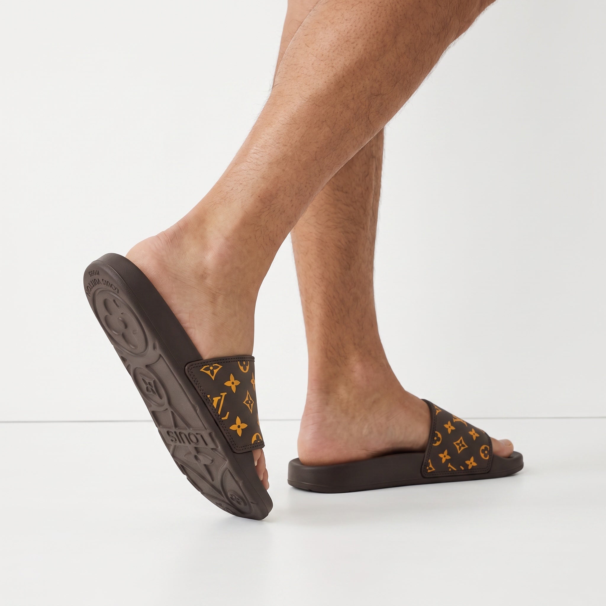 brown Louis Vuitton monogram slide sandal with embossed sole