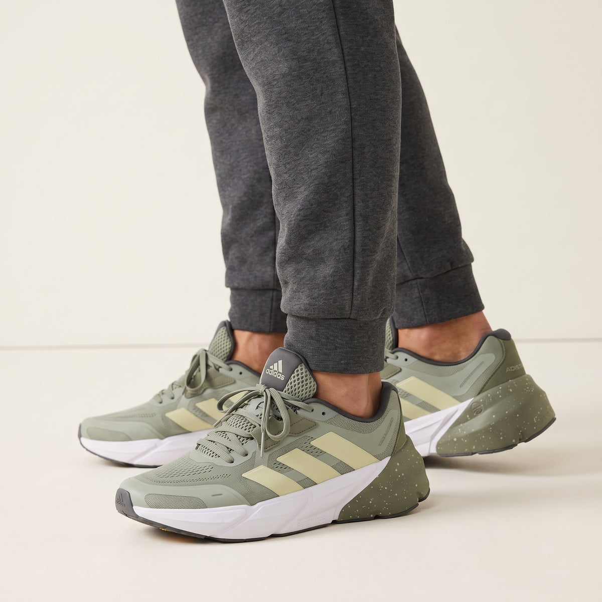 olive green adidas chunky sneakers with speckled midsole