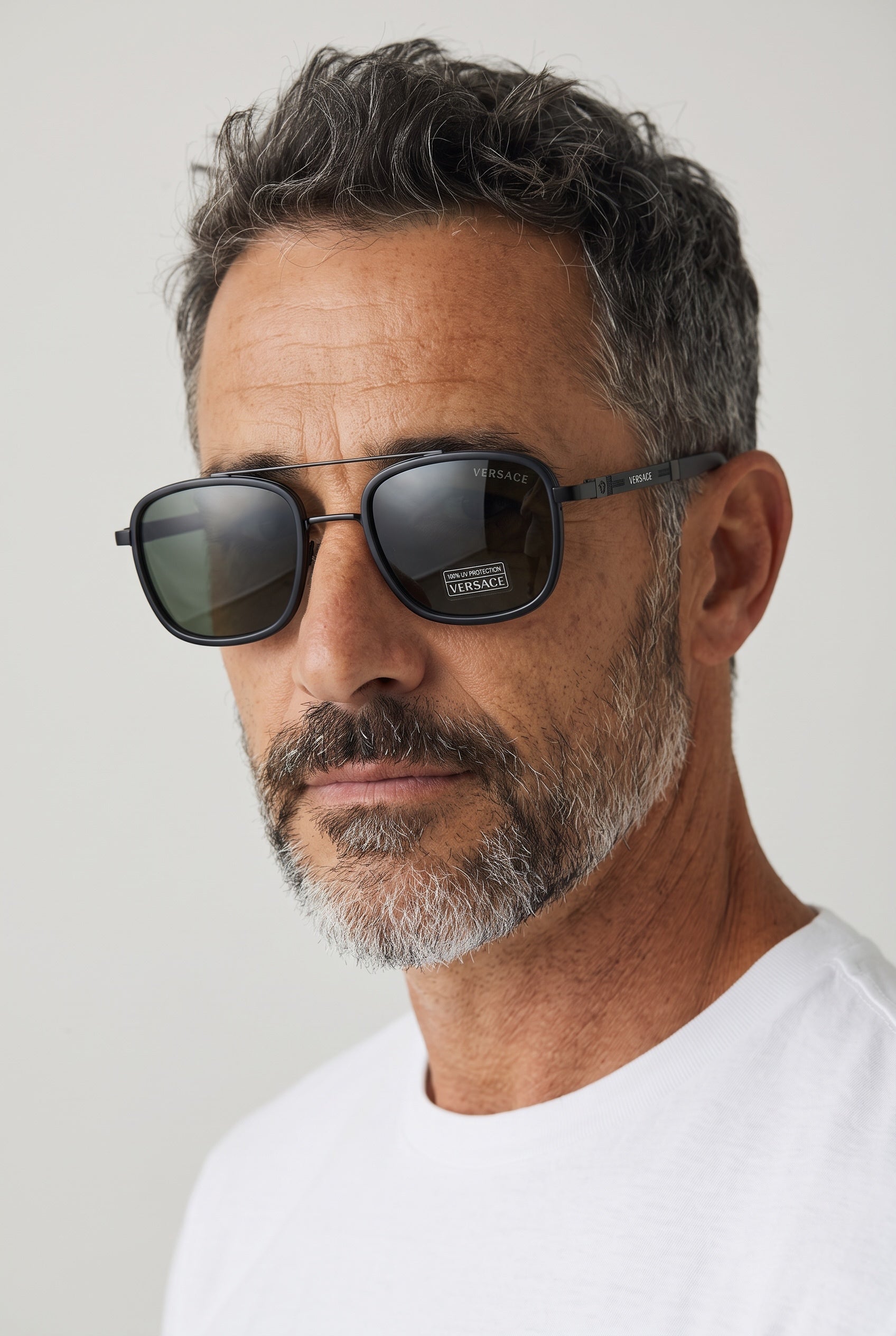 Versace matte black square men's sunglasses with visible logo on lens and temple