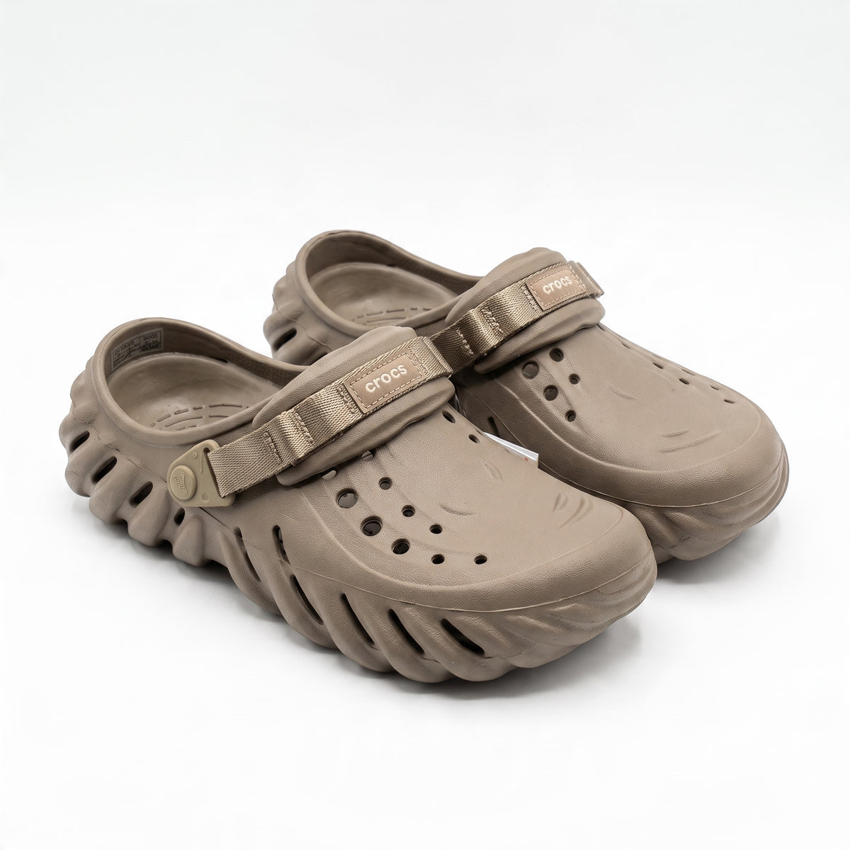 Pair of taupe Crocs Echo Clog with adjustable strap and vented upper