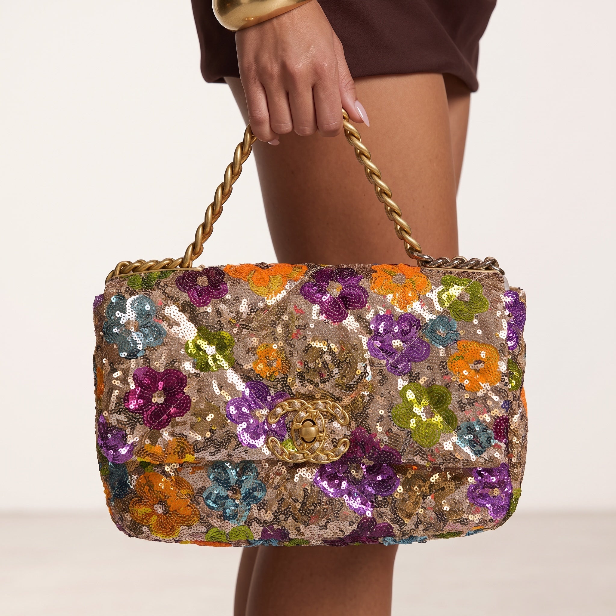 Chanel multicolor sequin flap bag with gold chain and double C turnlock