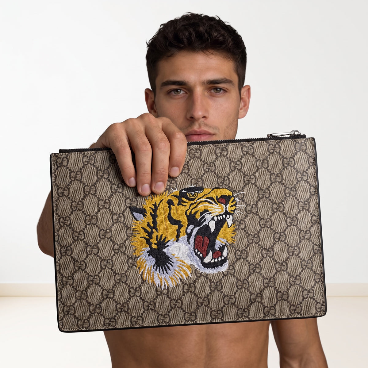 Gucci beige GG monogram pouch with embroidered tiger and top zipper