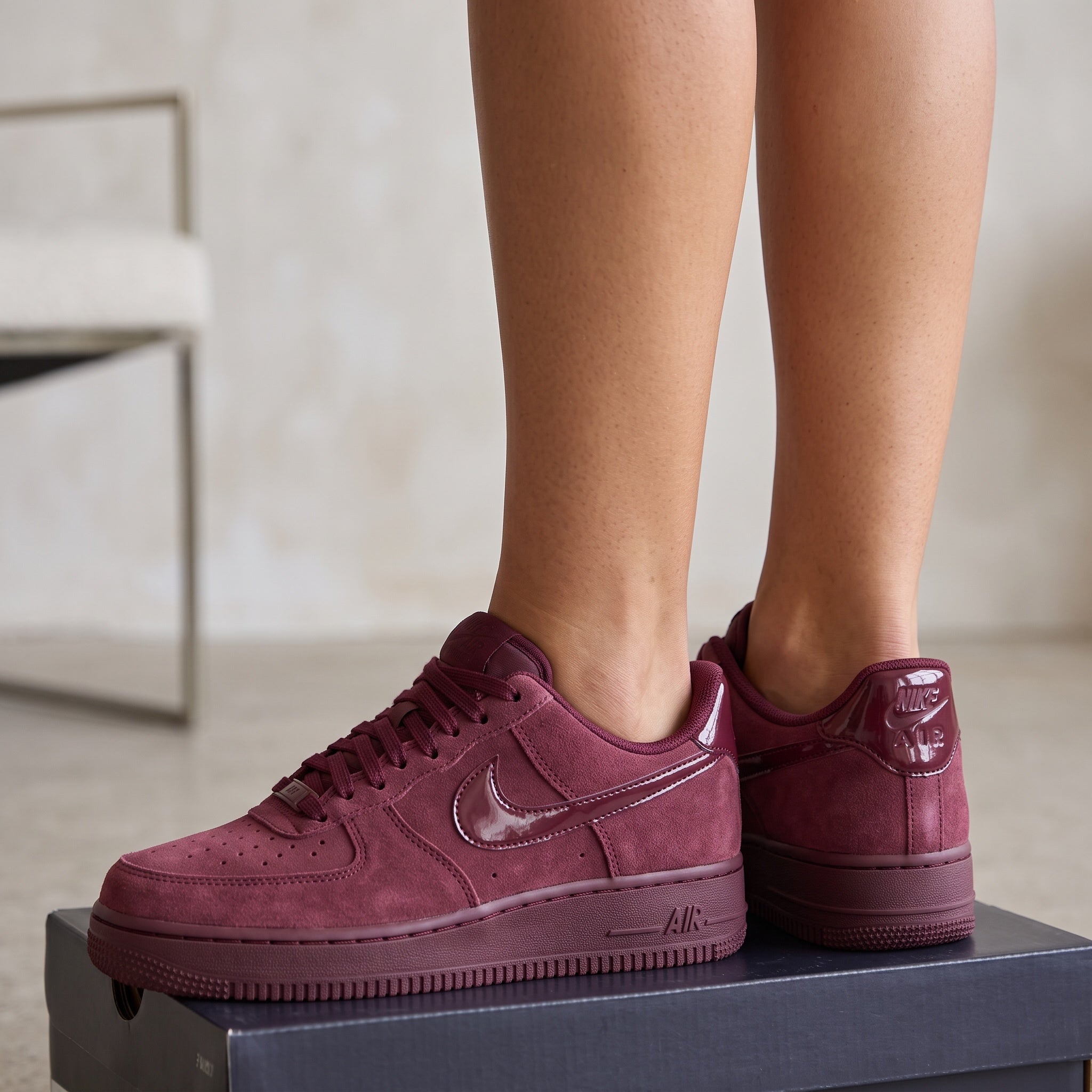 Nike Air Force 1 Low maroon suede sneakers with glossy swoosh