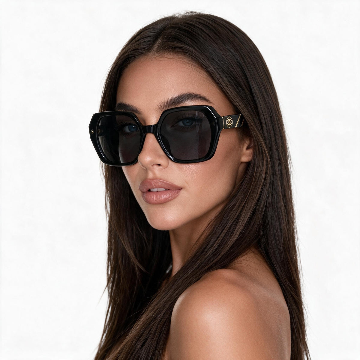Chanel oversized black sunglasses with gold CC logo on temple