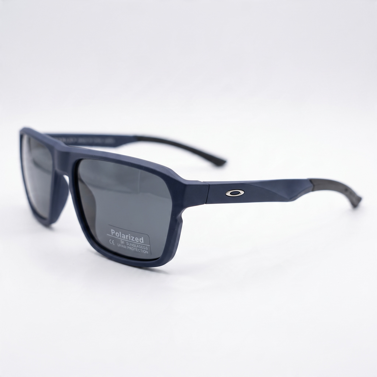 Oakley navy rectangular polarized sunglasses close-up