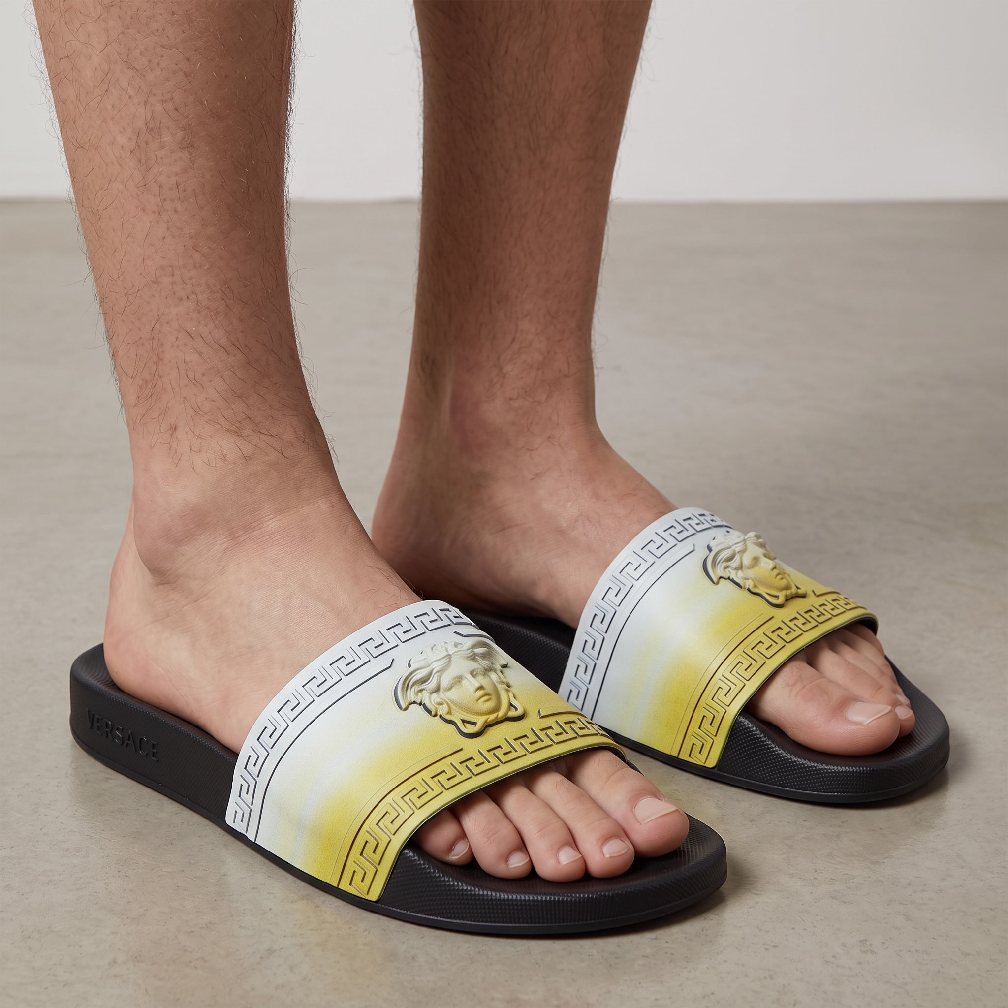 Versace yellow Medusa slides with Greek key strap on black footbed