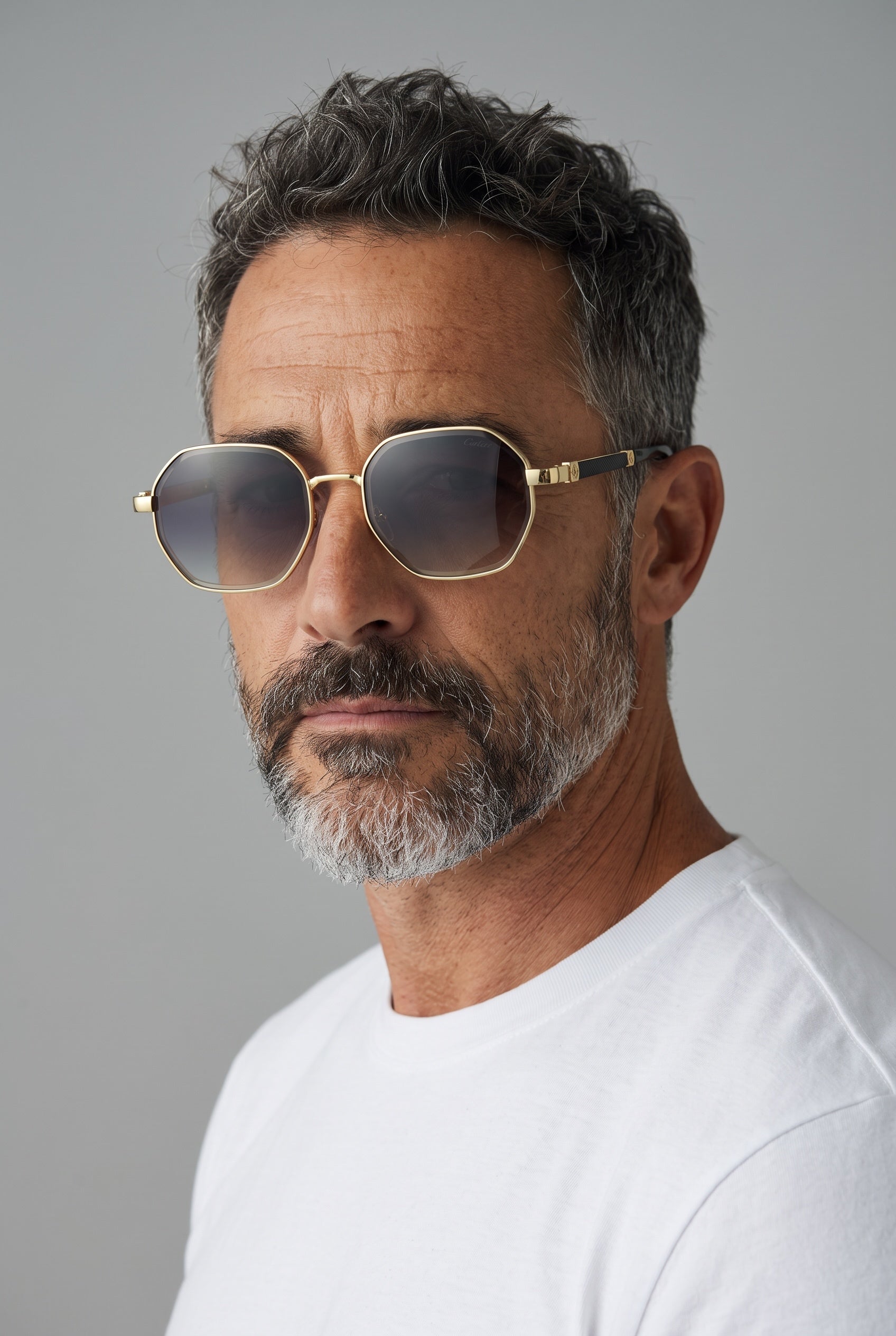 Cartier gold octagon sunglasses with gradient lenses and dark textured temples
