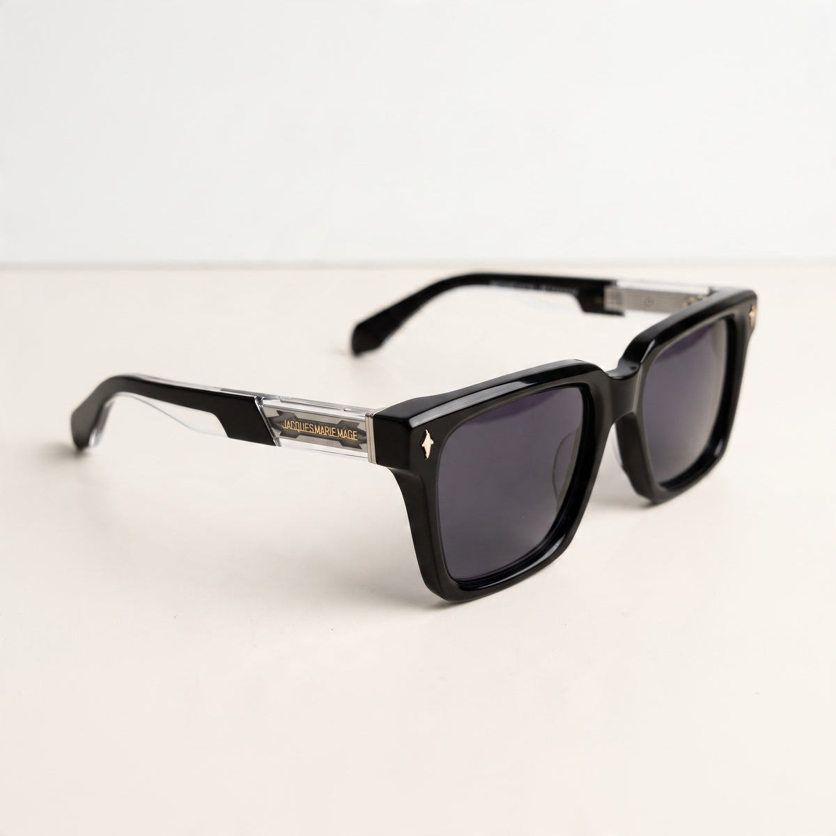 Jacques Marie Mage black oversized square sunglasses with dark lenses and clear temple detail