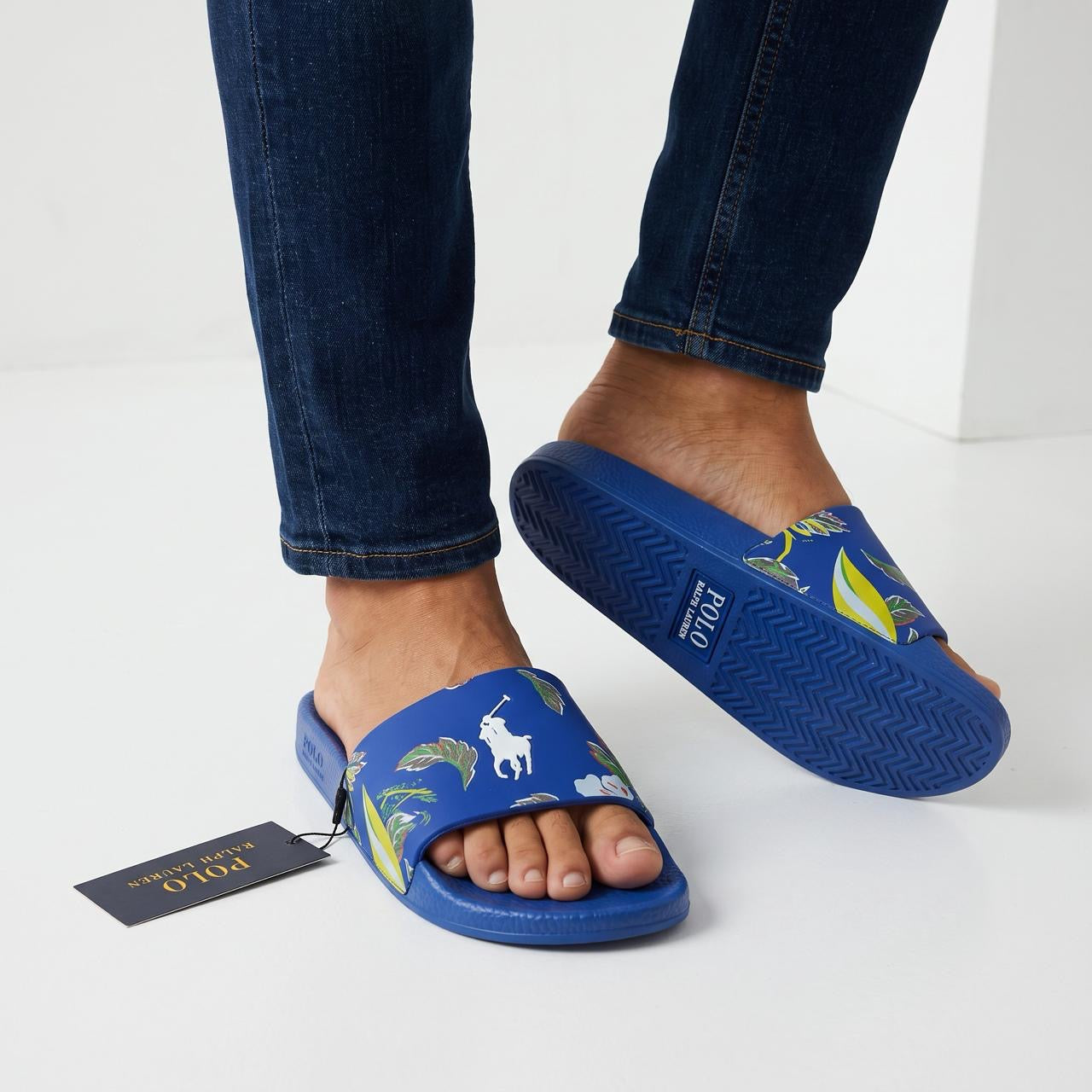 Blue Polo Ralph Lauren men's slide sandals with tropical floral print and white pony logo