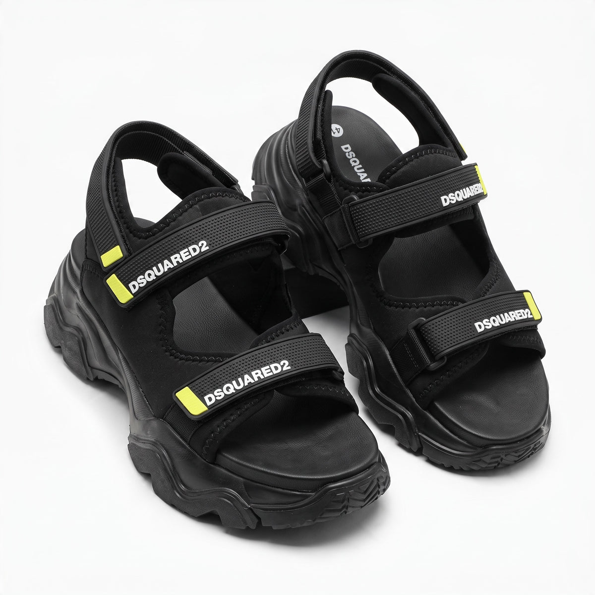 Black DSQUARED2 chunky sandals with Velcro straps and neon yellow accents