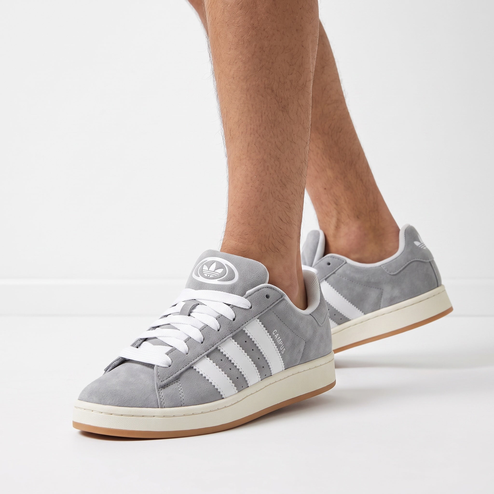 Adidas Campus low-top grey suede sneakers with white 3‑Stripes and gum sole
