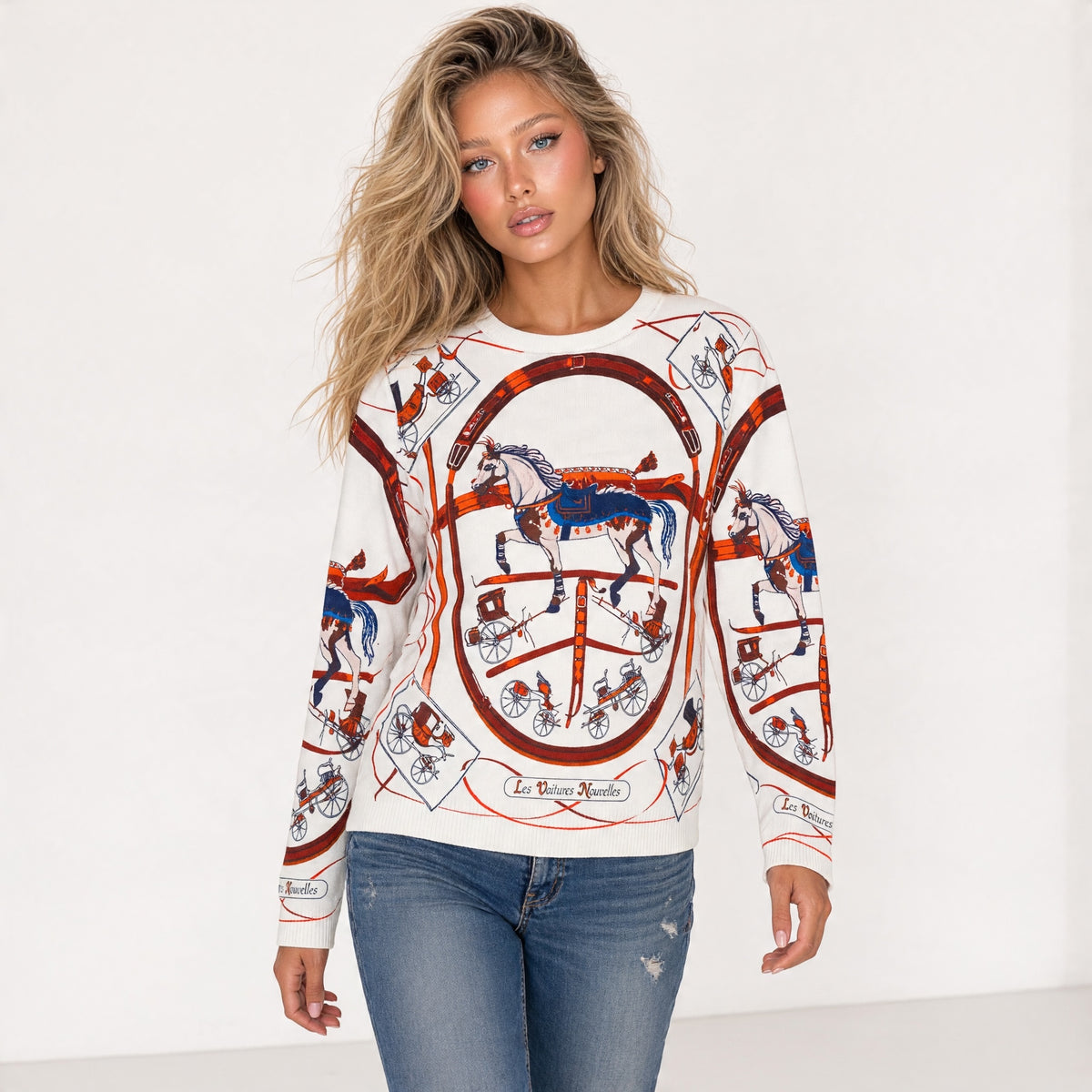 Hermès ecru crewneck sweater with red and navy carousel horse and carriage print
