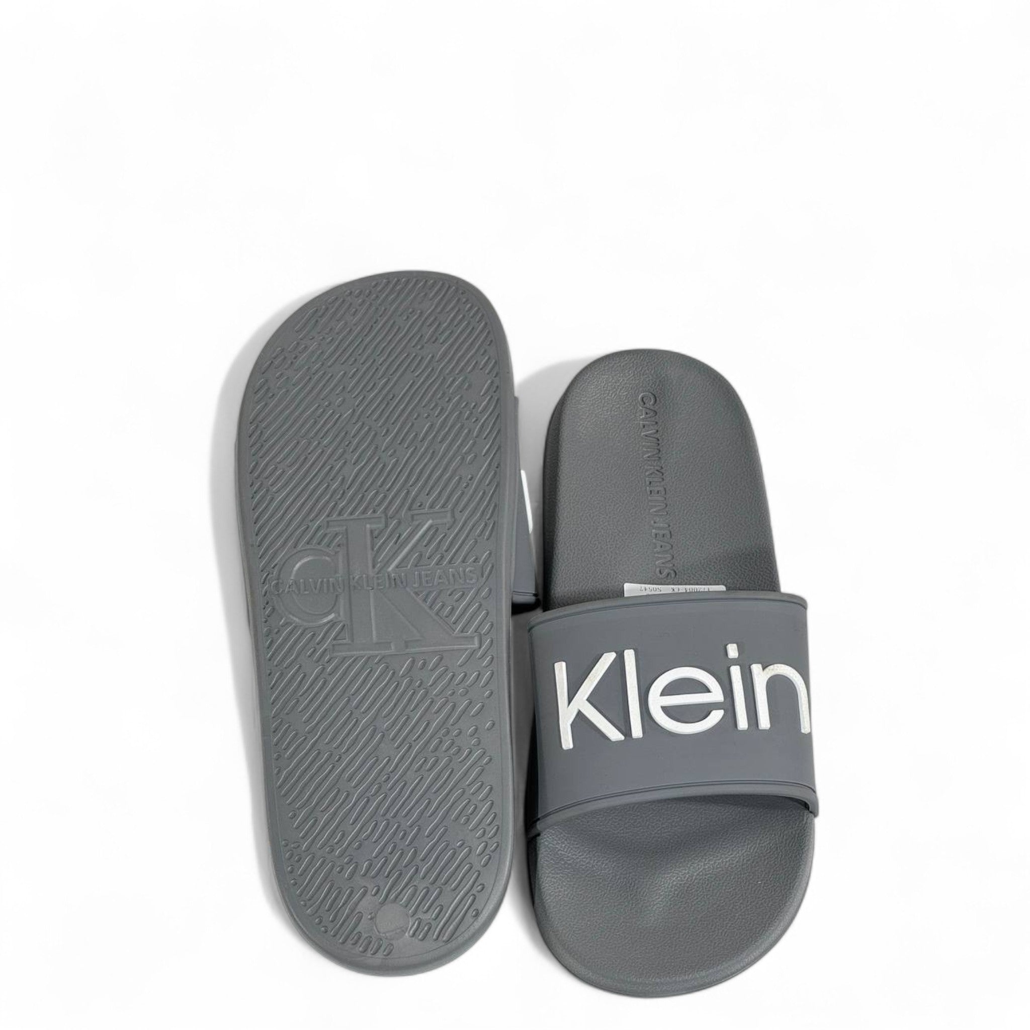 ⚪ Calvin Klein Grey Slides | Minimalist Comfort & Modern Style