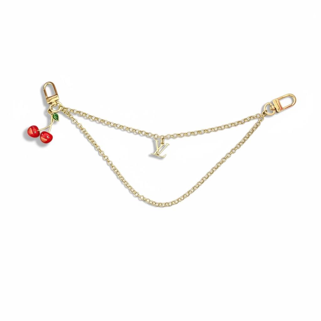 Louis Vuitton Gold Double-Chain Bag Charm with Cherry Pendant – Cute Luxury Accessory 🍒✨