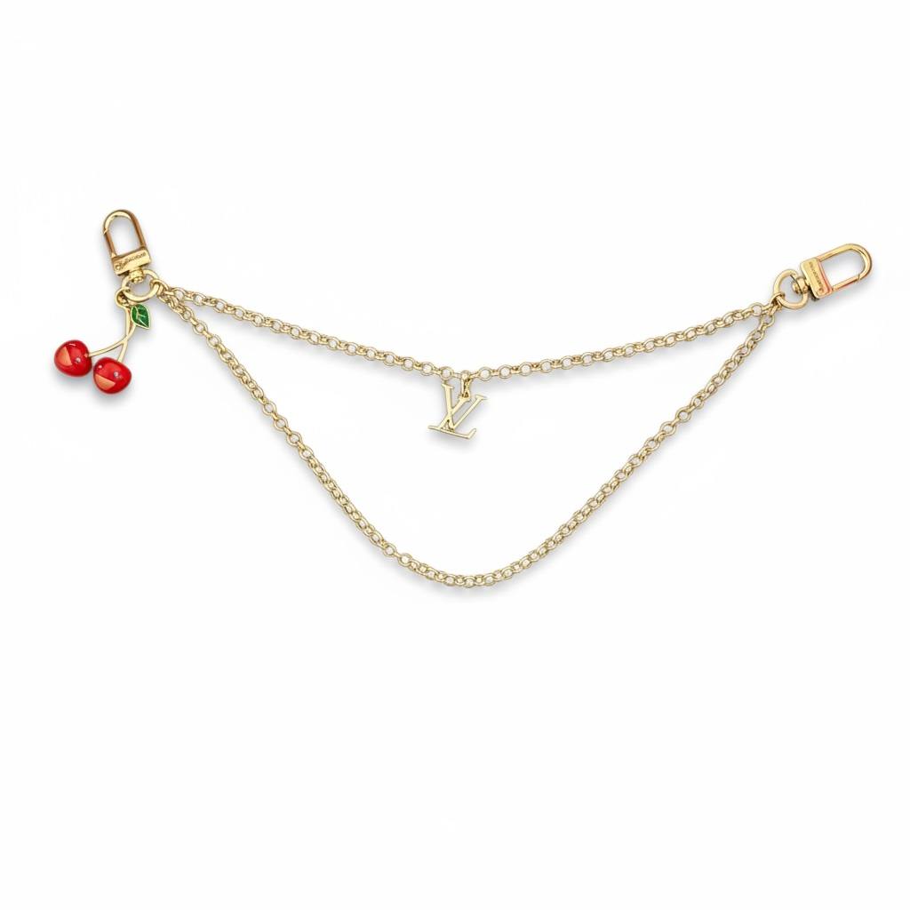Louis Vuitton Gold Double-Chain Bag Charm with Cherry Pendant – Cute Luxury Accessory 🍒✨