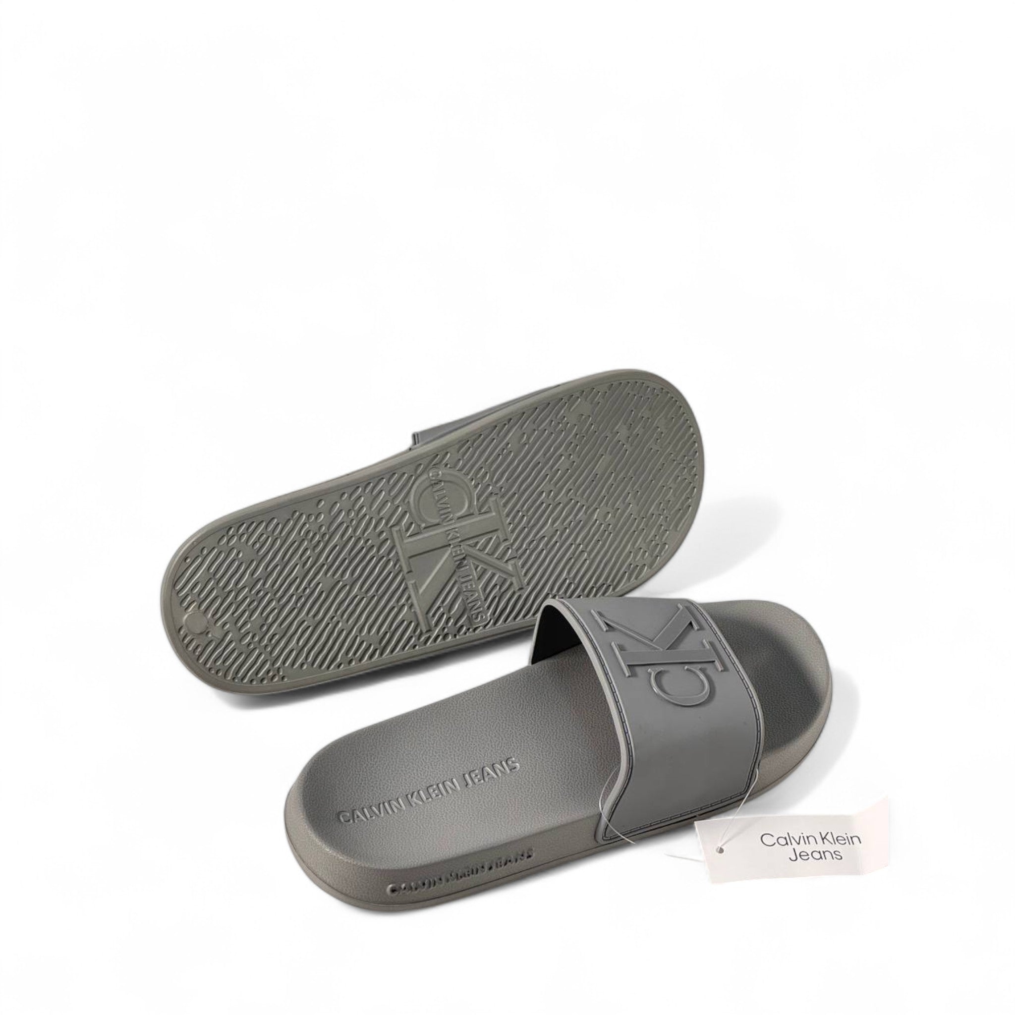 Calvin Klein Monochrome Slides – Grey | Minimalist Comfort ☁️🩶✨ wet