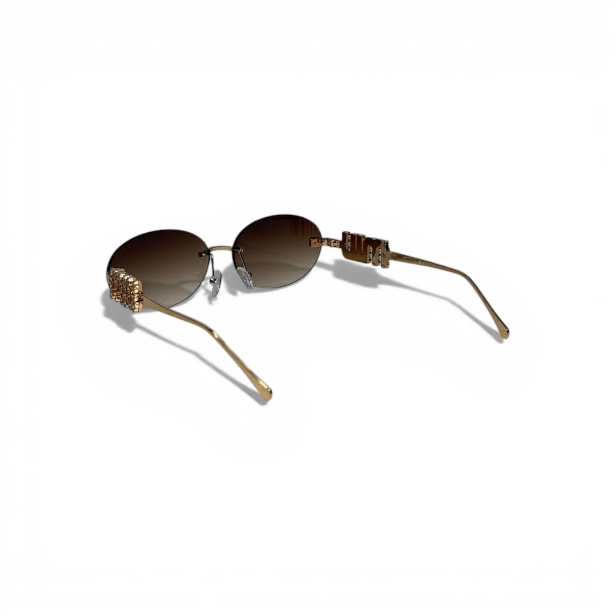 🕶️ MIU MIU Oval Sunglasses – Gold Metal Frame with Crystal Temple Detail 🕶️