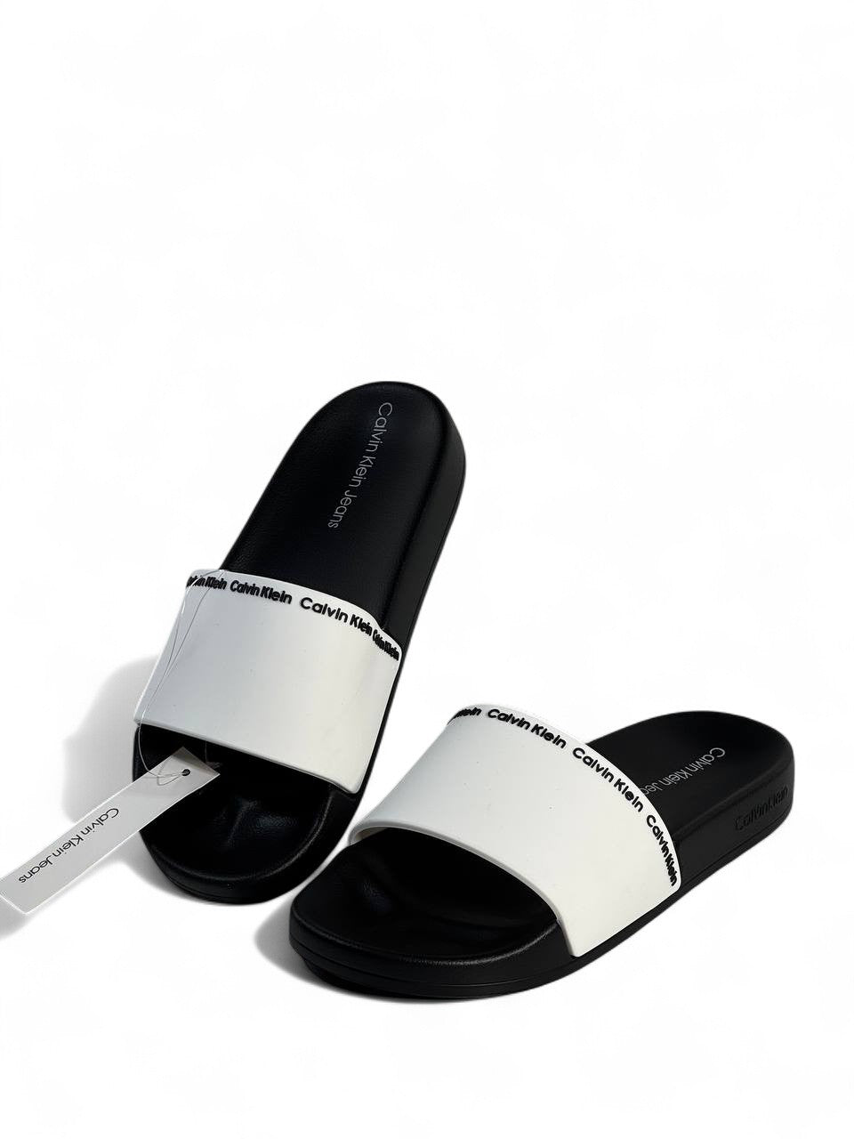 Calvin Klein Jeans Men’s Slides – White & Black 🖤🤍 | Modern Summer Comfort ☀️👟