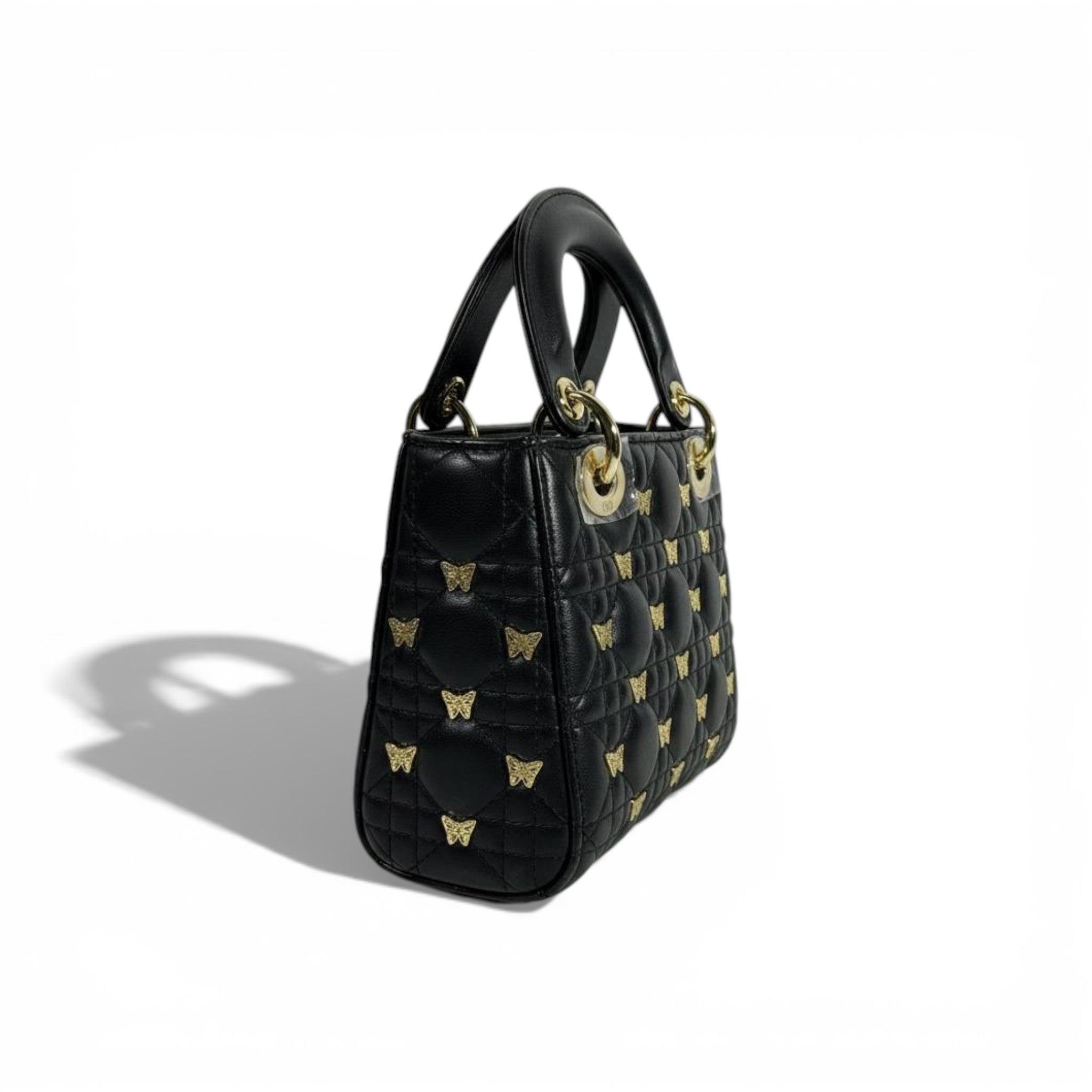👜 Dior Black Quilted Mini Top-Handle Bag with Gold Butterfly Details 🖤✨