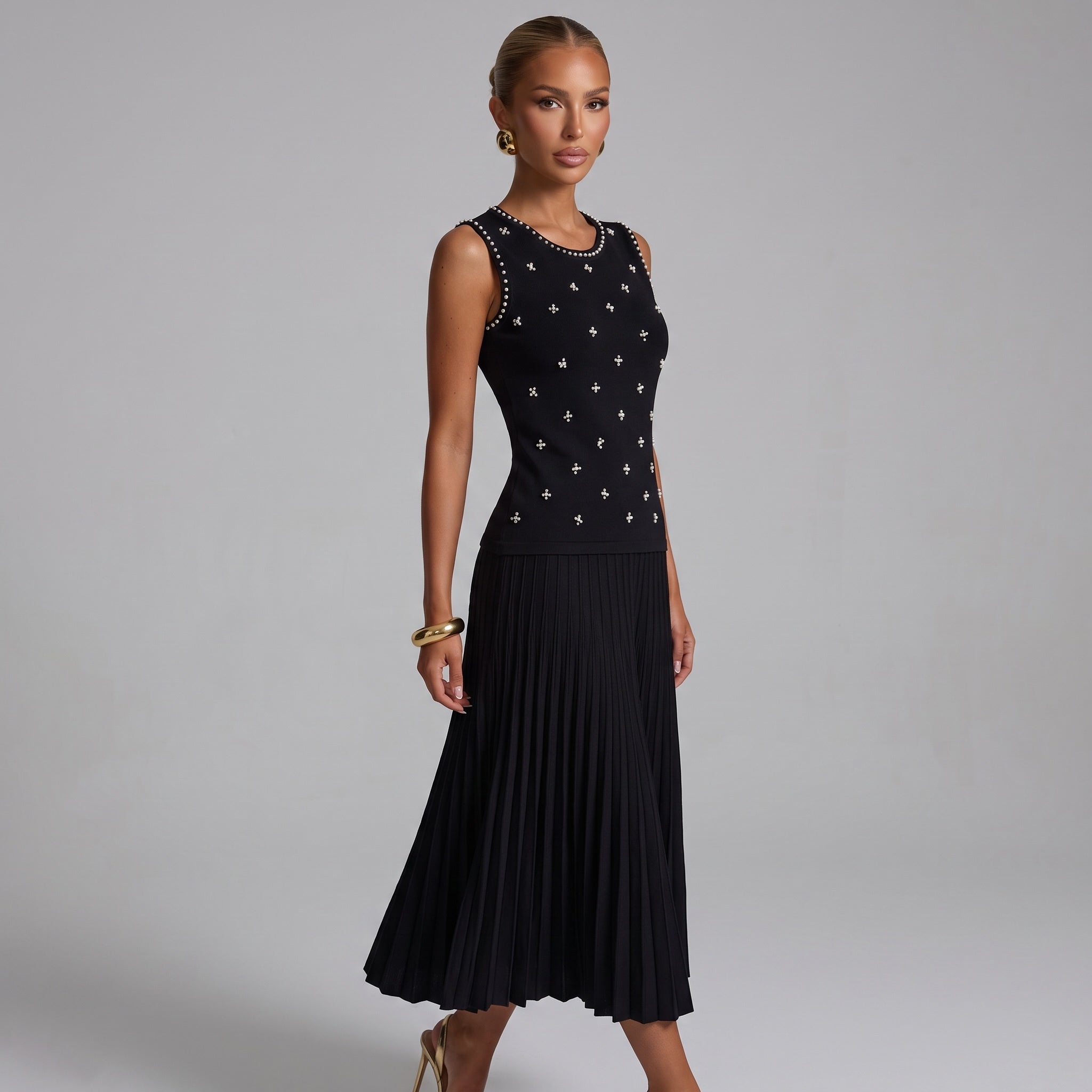 black sleeveless knit tank with pearl-like studs