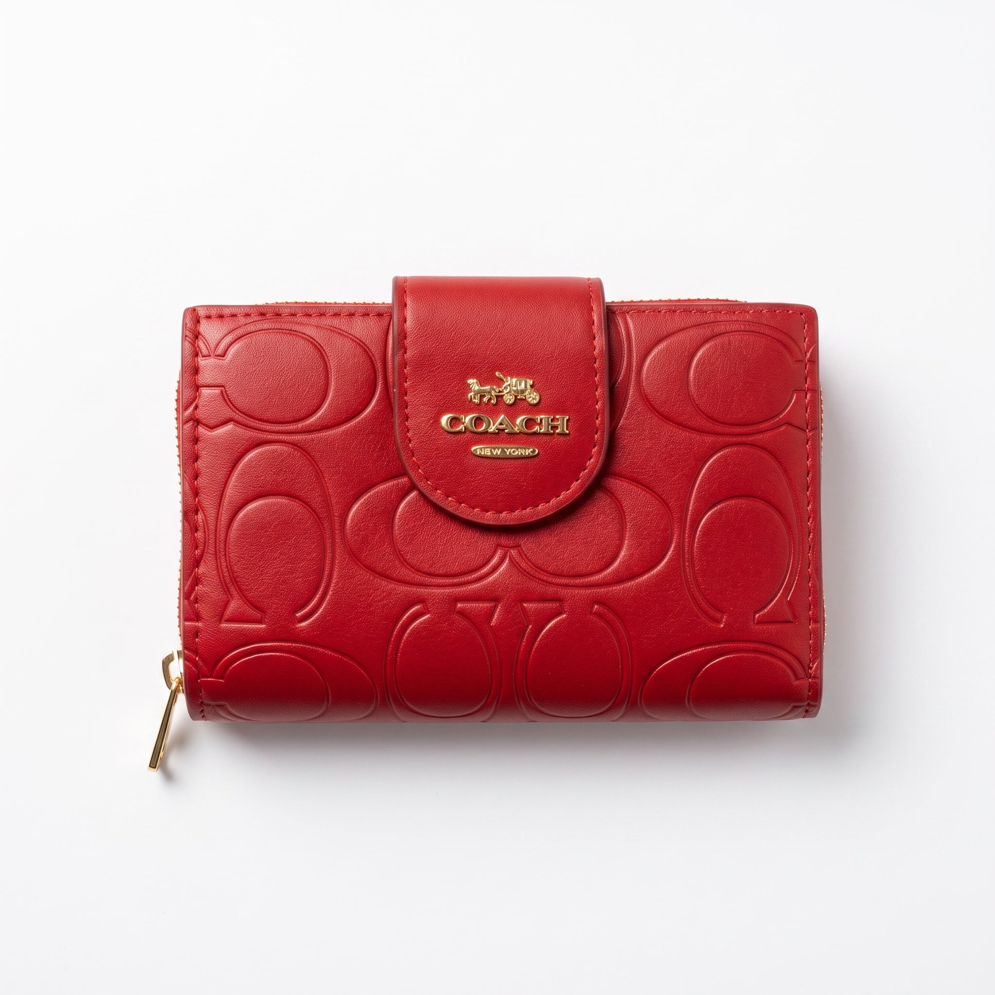 Red Coach compact embossed signature wallet with gold logo and zipper