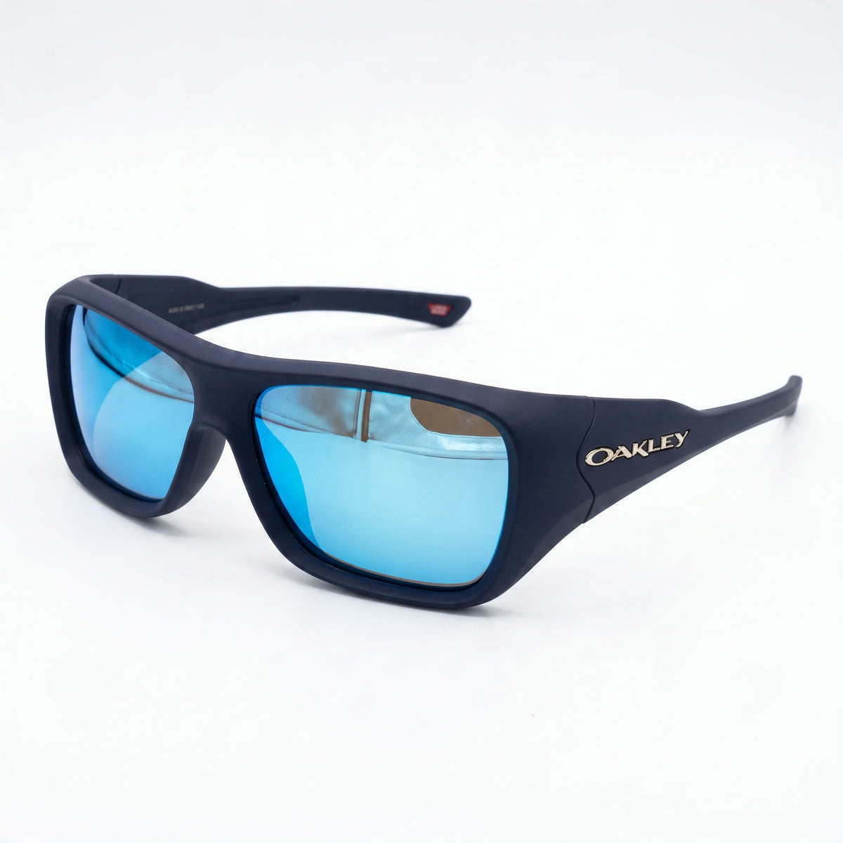 Oakley navy wrap sunglasses with blue mirrored lenses, close-up.