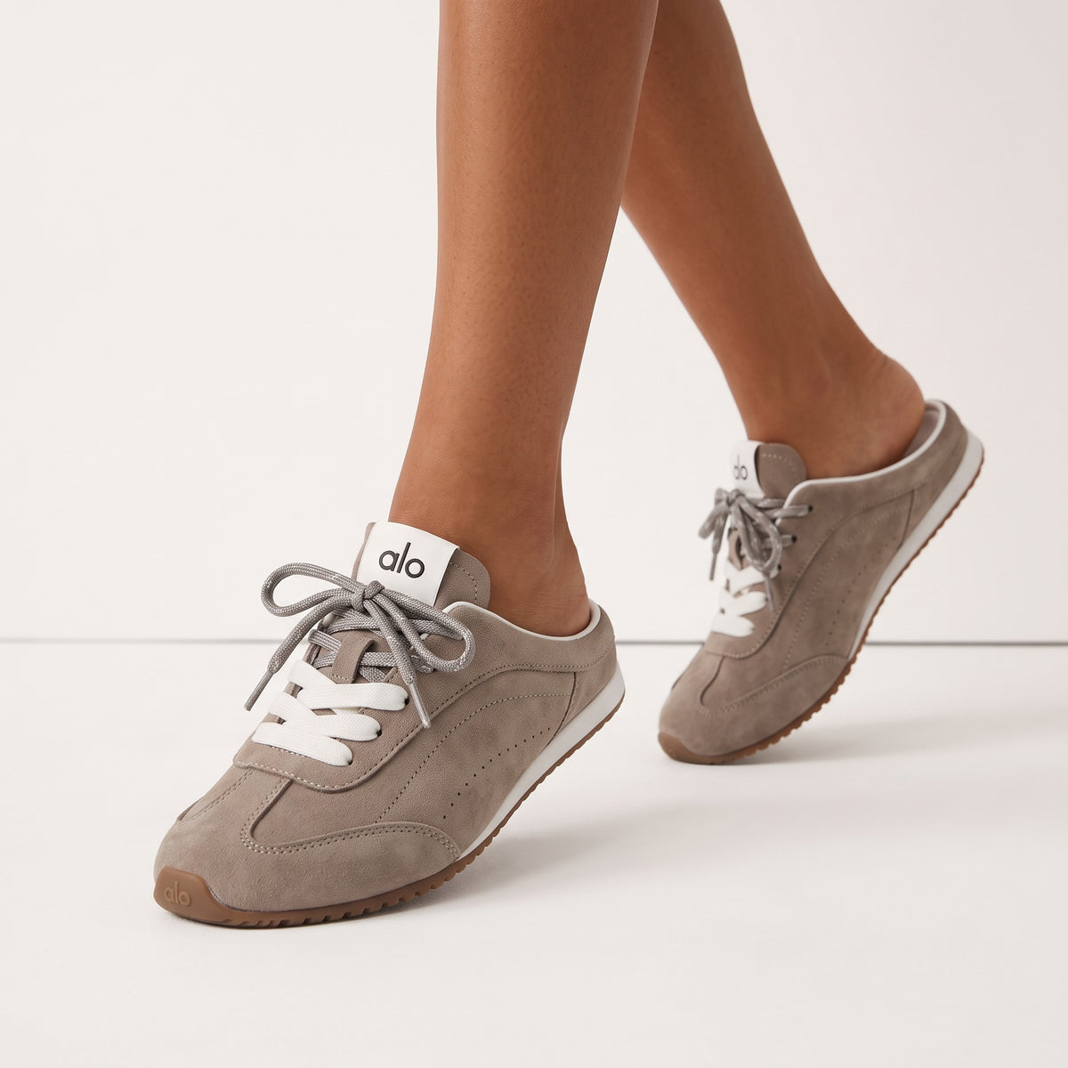 Taupe Alo low-top sneakers with gum sole and white accents