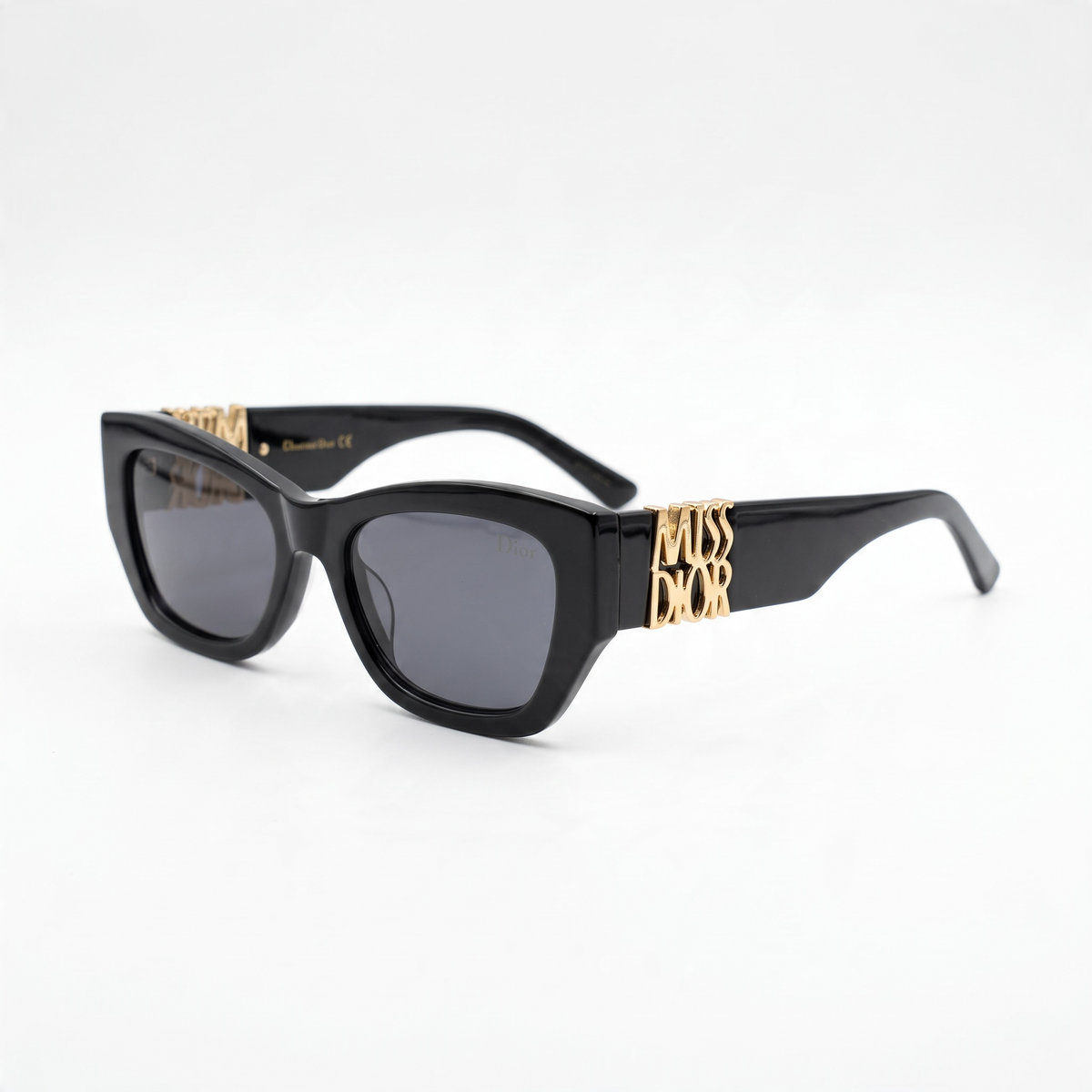 Black Dior sunglasses with gold MISS DIOR plaque on temple and dark lenses