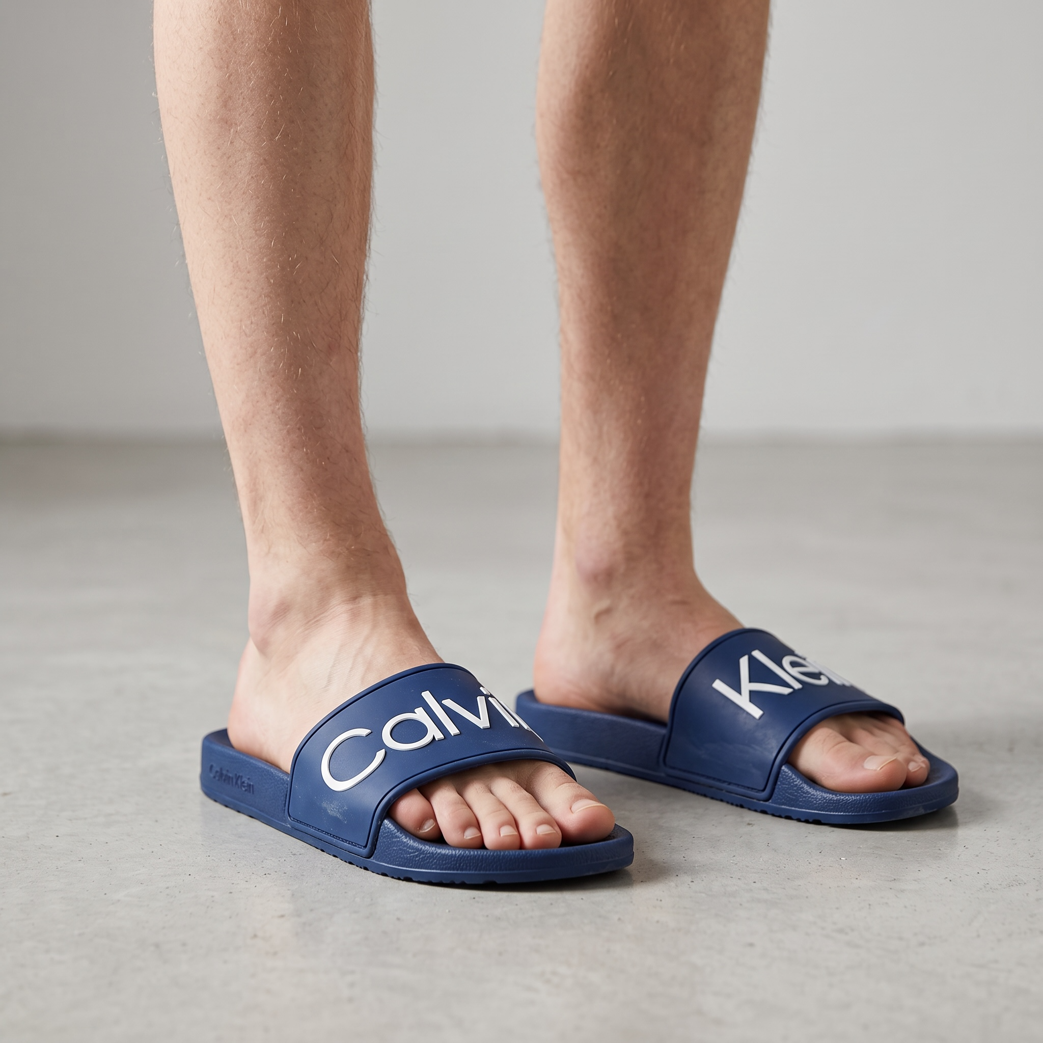 Calvin Klein Navy Blue Slides – Modern Comfort & Iconic Style