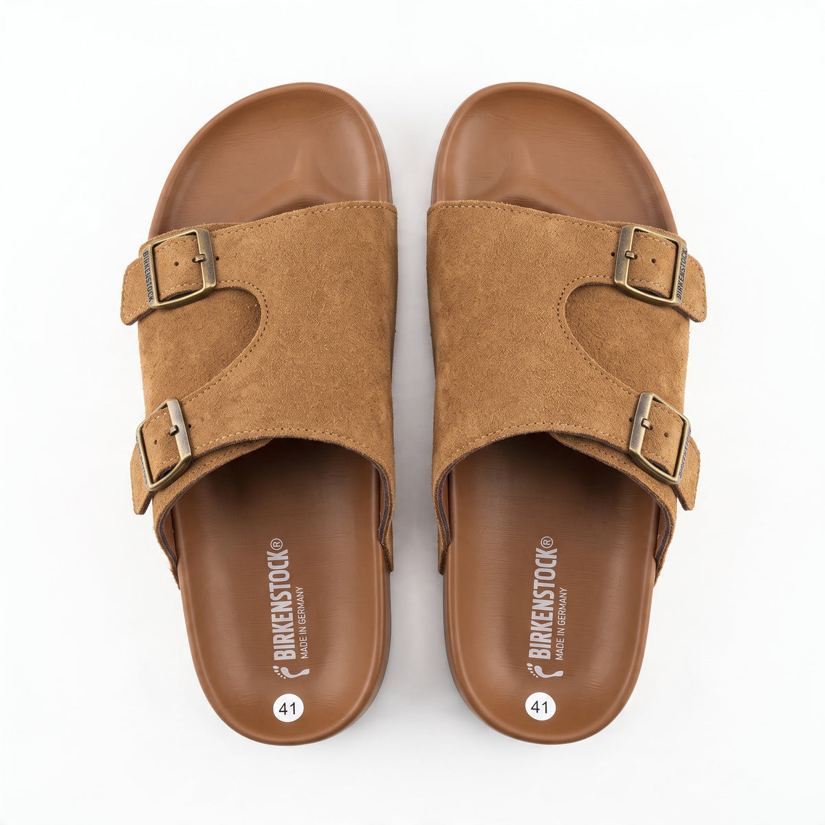 Top view of Birkenstock Arizona suede double-buckle cognac sandals showing footbed and buckles