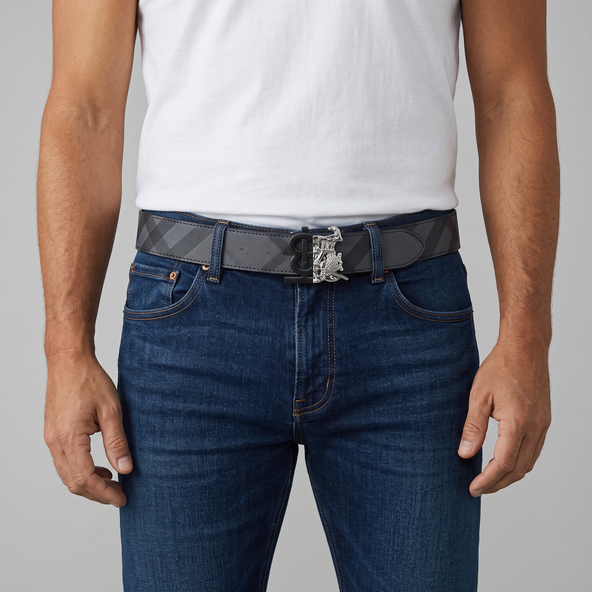 Men's grey check Burberry belt with silver buckle worn with jeans