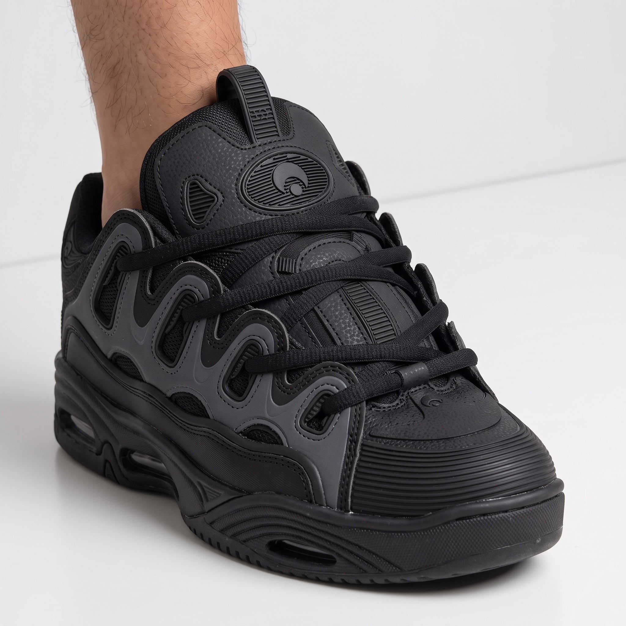 Osiris D3 2001 triple black chunky sneakers with sculpted sole and layered panels
