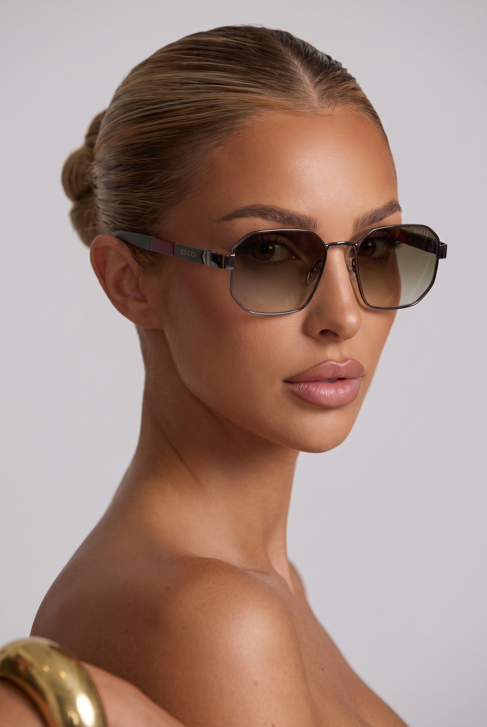 Gucci brown gradient sunglasses with metal geometric frame and branded temples