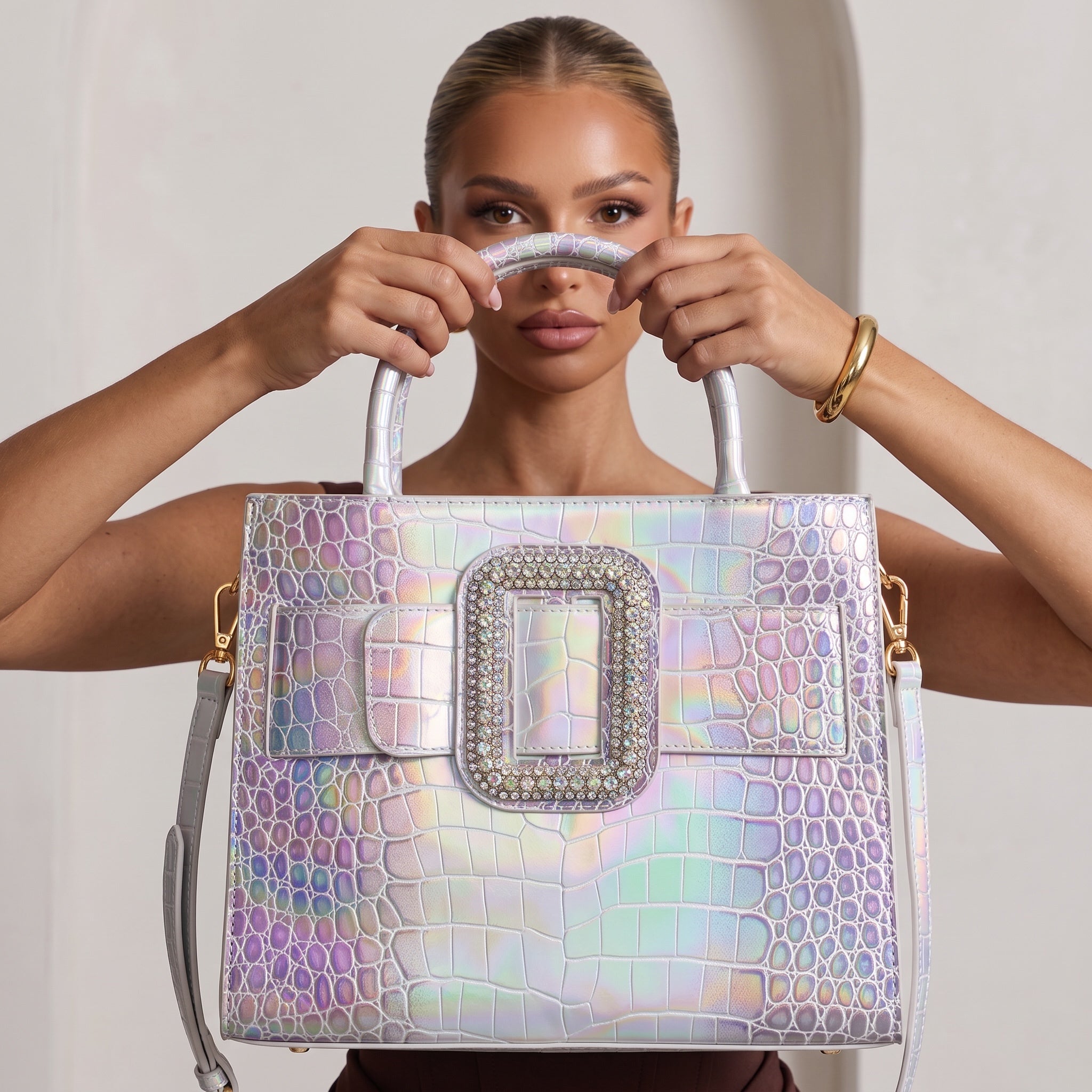 Iridescent croc-embossed tote with crystal buckle and detachable strap