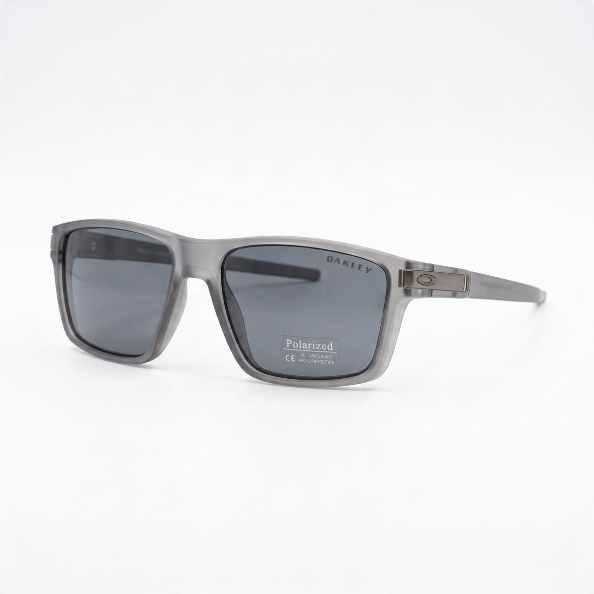 Oakley grey translucent frame sunglasses with dark polarized lenses