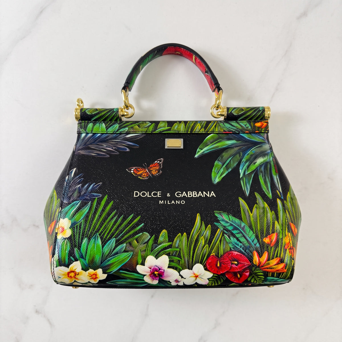 Dolce & Gabbana black Sicily top-handle bag with colourful tropical floral and butterfly print and gold hardware
