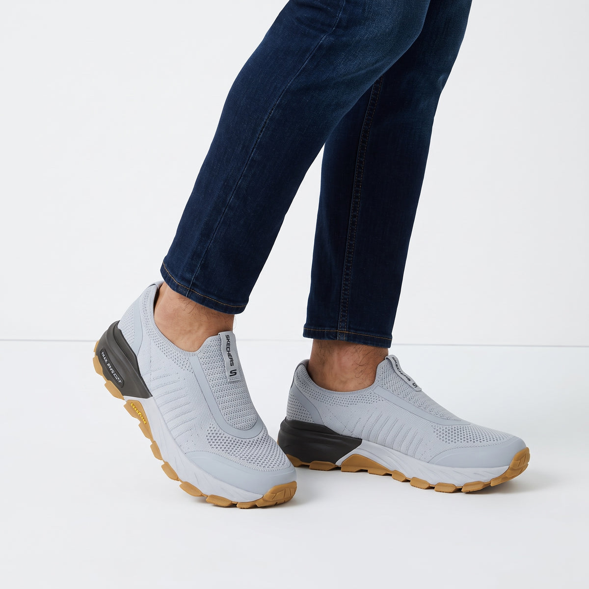Skechers light grey slip-on knit sneakers with gum sole