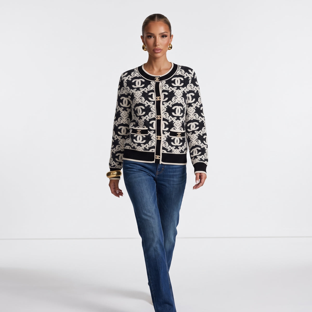 Black and ivory Chanel knit cardigan with CC buttons and patch pockets