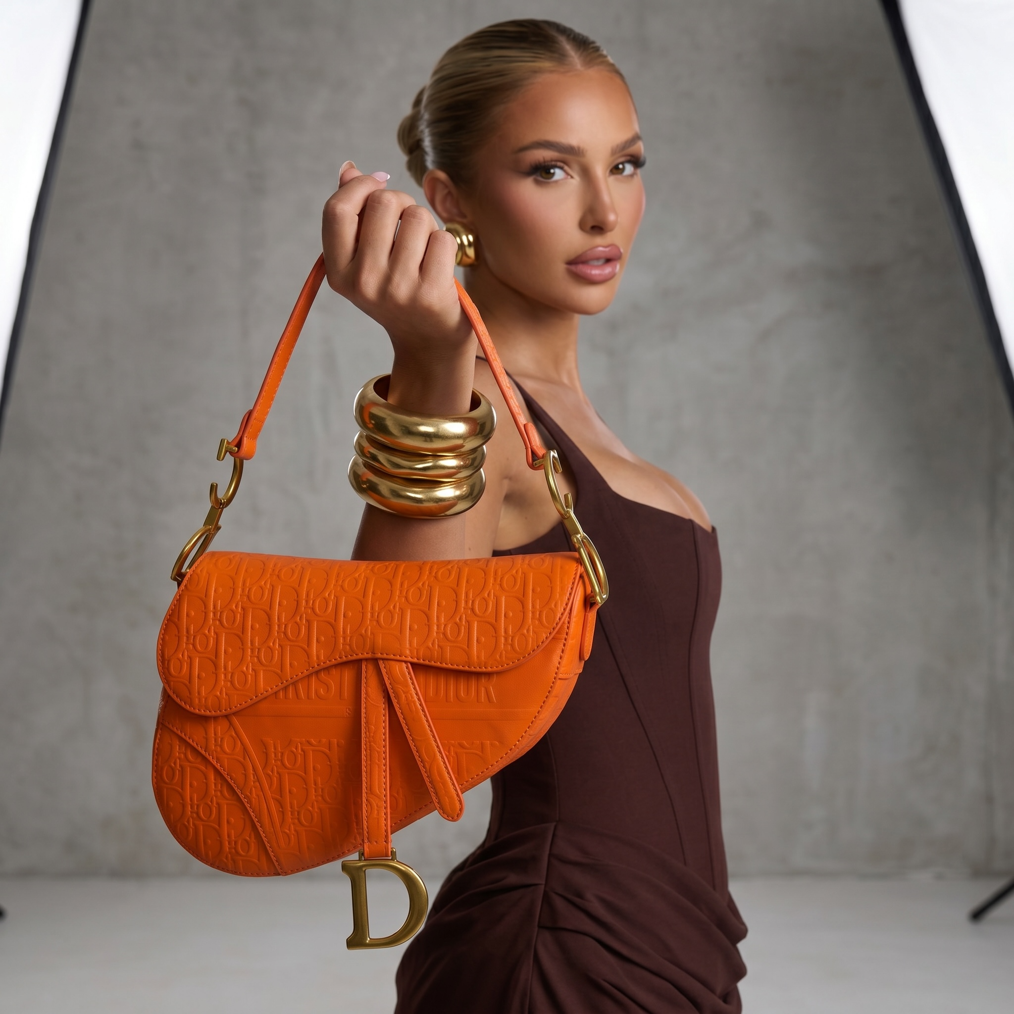 🧡 Christian Dior Saddle Bag – Orange Oblique Embossed Leather