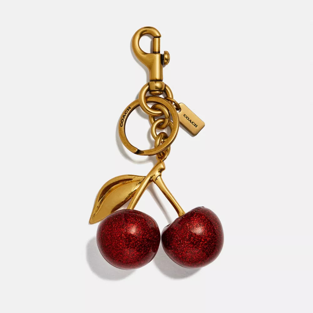 Coach Cherry Bag Charm – Gold & Red Glitter Keychain