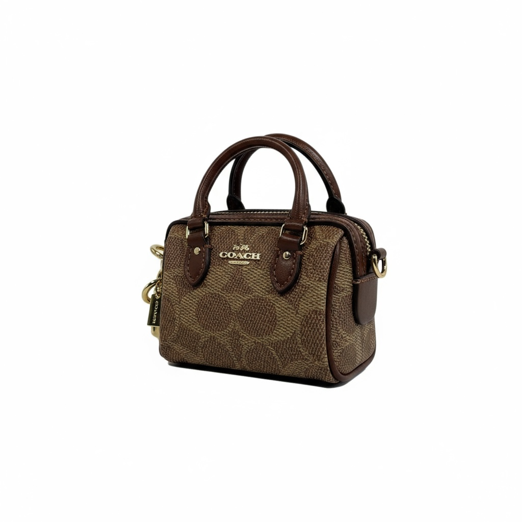 🤎 Coach Mini Signature Brown Bag Charm – Timeless Chic in Mini Form 👜