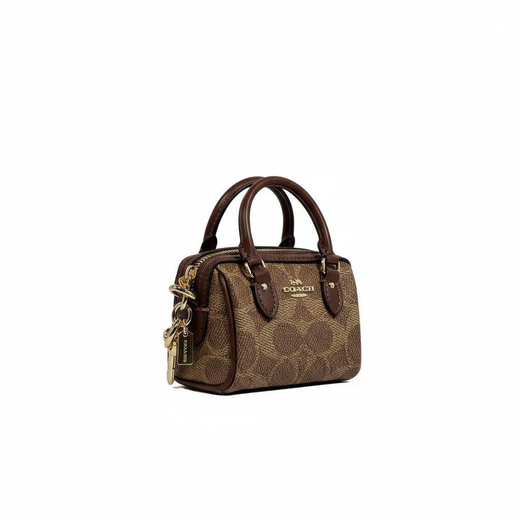 🤎 Coach Mini Signature Brown Bag Charm – Timeless Chic in Mini Form 👜