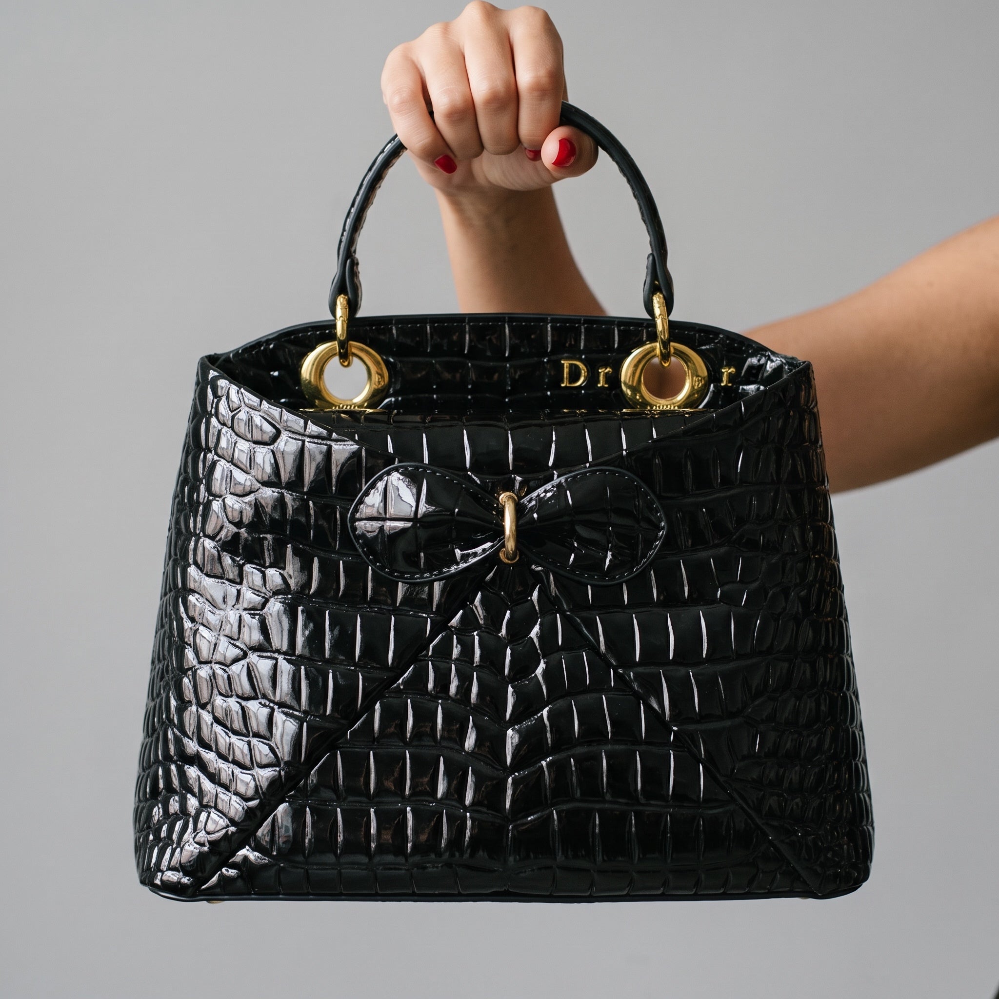 Black Dior Lady patent croc-effect top-handle tote with gold rings and bow detail
