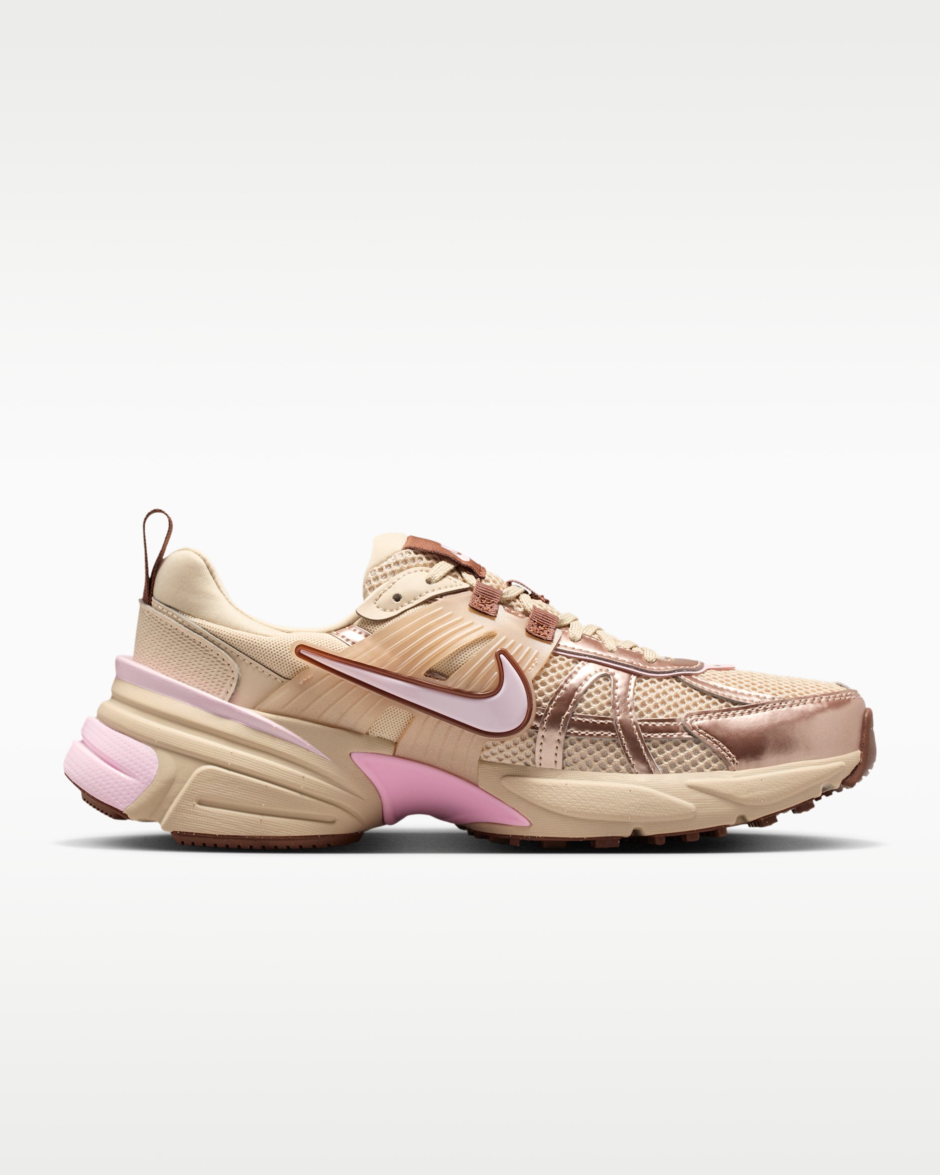Nike tan and pink chunky sneaker with mesh upper and metallic overlays