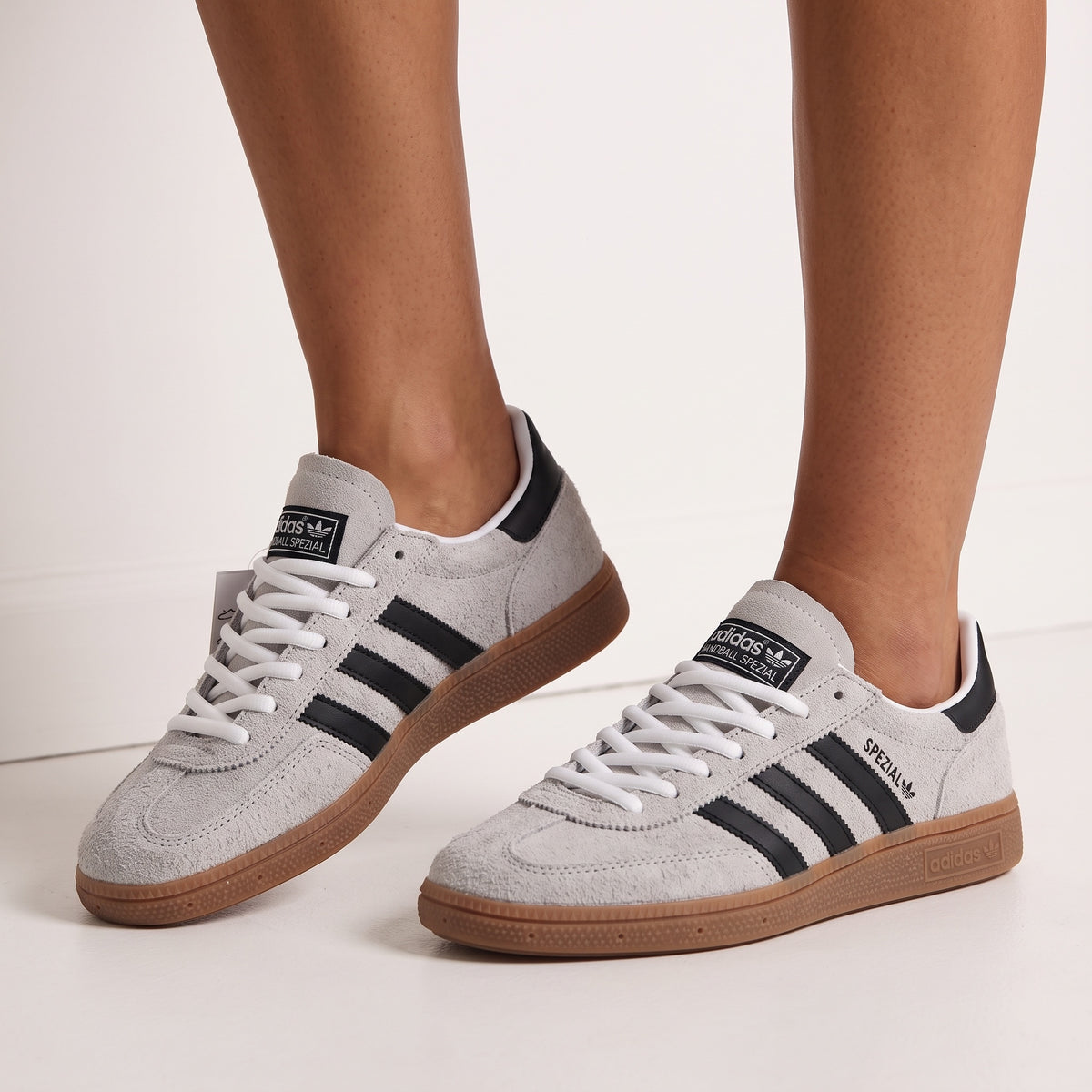 Adidas Handball Spezial white sneakers with black stripes and gum sole